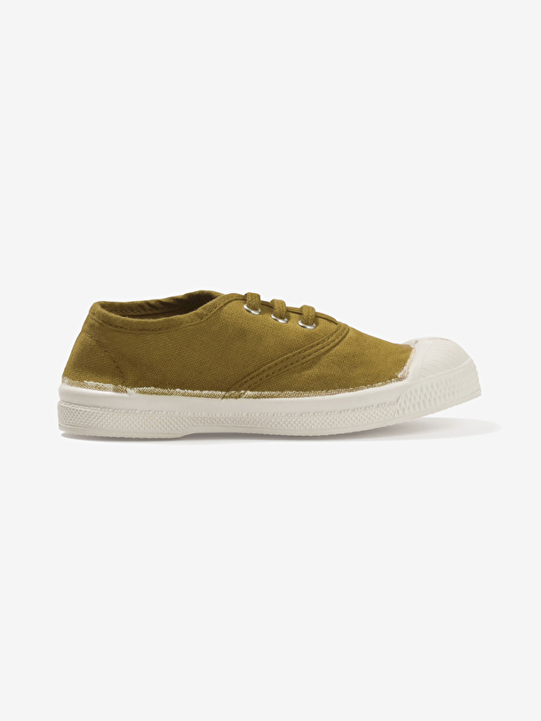 los niños cordones de tenis superávit