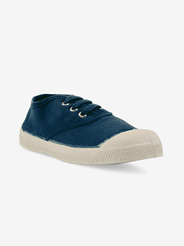 los niños cordones de tenis en el extranjero