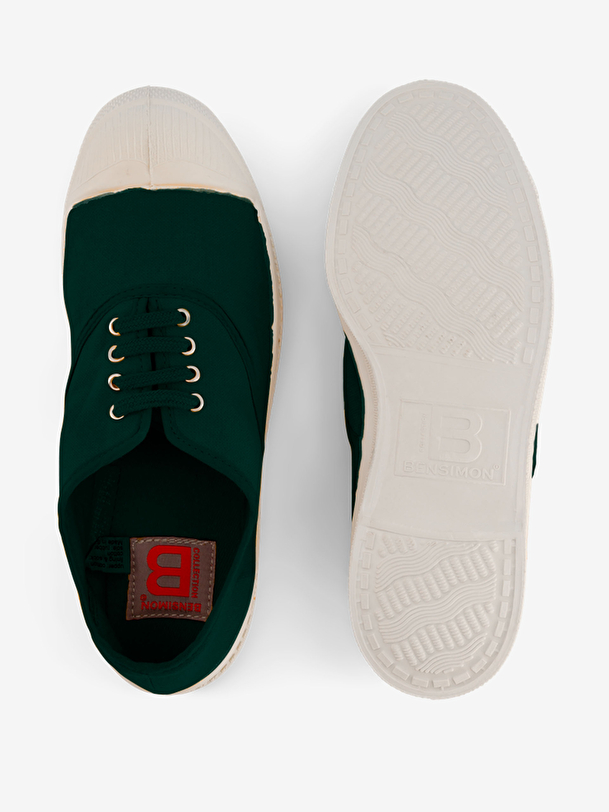 los hombres cordones de tenis de botella