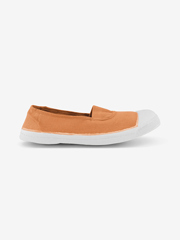 mujer elástica de tenis de coral