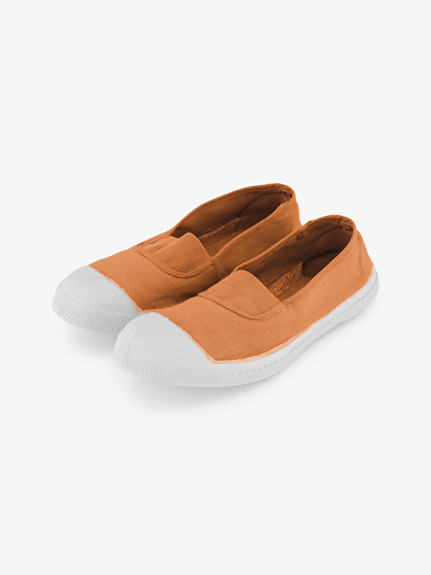 mujer elástica de tenis de coral