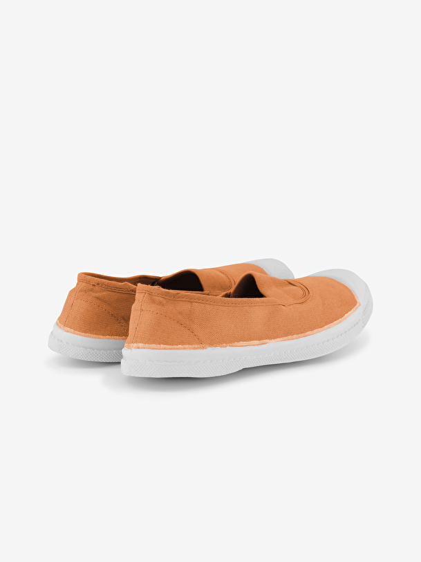 mujer elástica de tenis de coral