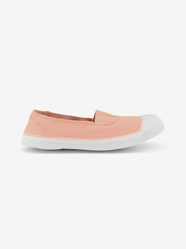 mujer elástica de tenis de color rosa