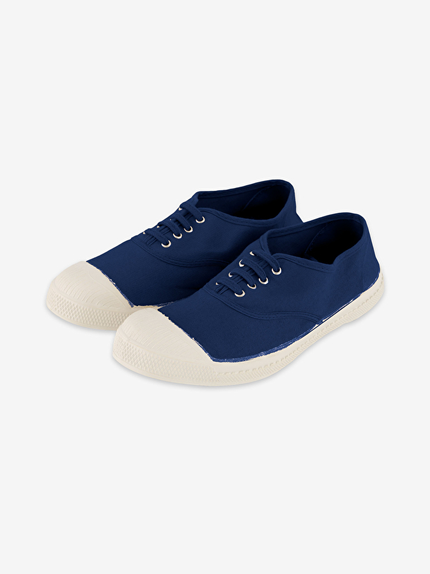 mujer de encaje-up de tenis indigo