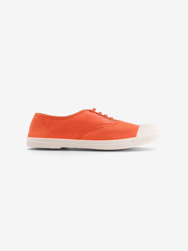 las mujeres cordones de los tenis de albaricoque