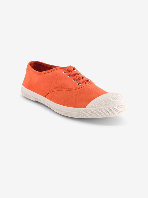 las mujeres cordones de los tenis de albaricoque