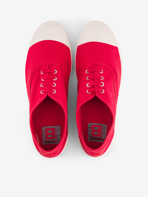 las mujeres cordones de los tenis de pasión