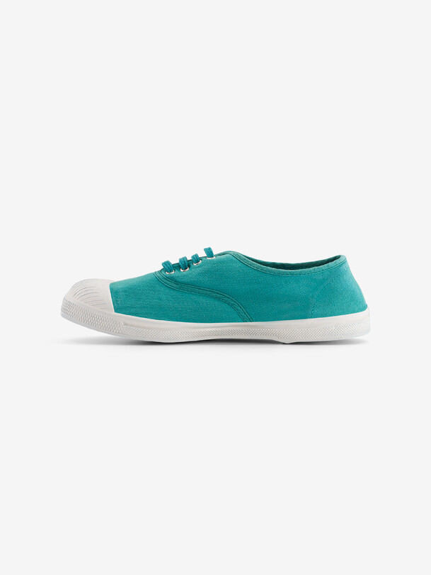 las mujeres cordones de los tenis de color turquesa